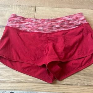 Red Lululemon shorts